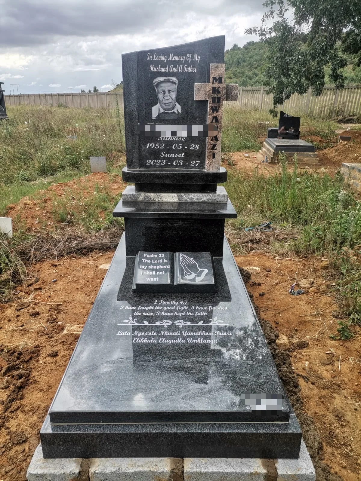 Detailed engraved memorial portrait on polished granite stone